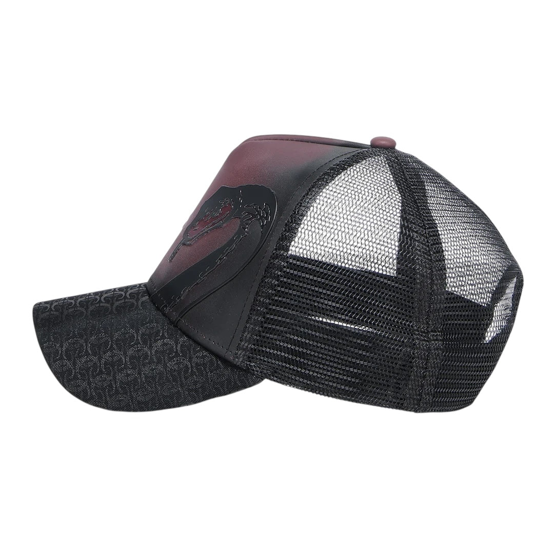 Gorra en piel genuina con diseño de pitón
