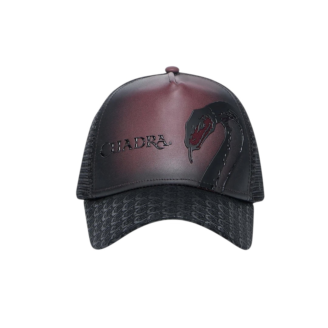 Gorra en piel genuina con diseño de pitón